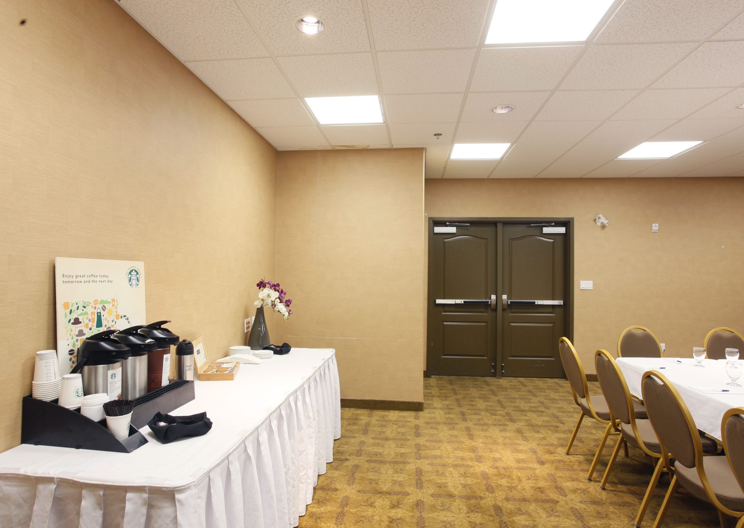 Banquet table with Starbucks coffee and other beverages at the Pomeroy Hotel & Conference Centre - Fort St. John in Alberta, Canada.