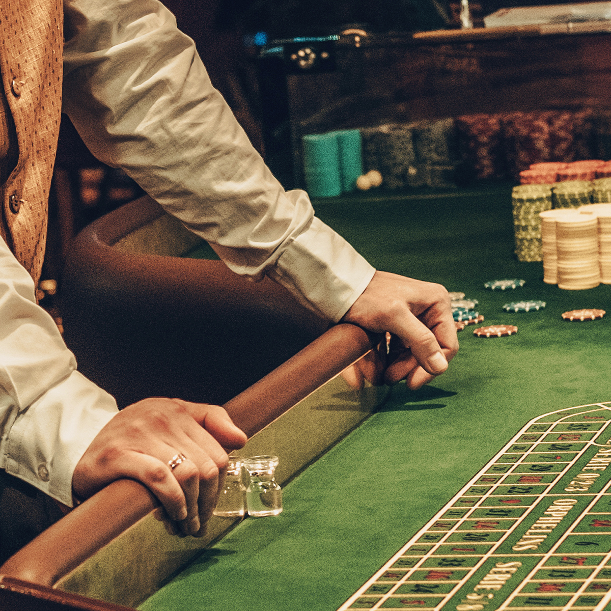 Croupier working at casino table